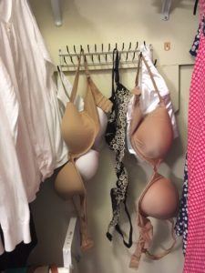 bra storage bras hanging on tie/belt rack