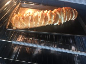 Onion, smoked paprika, and provolone baked bread