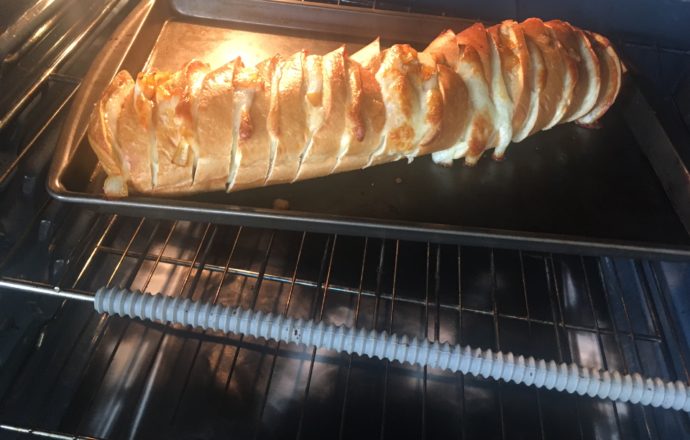 Onion, smoked paprika, and provolone baked bread