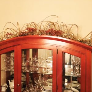 Decorating a curved top cabinet for Christmas