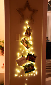 Christmas card display made from cool-touch LED lights and Command hooks.